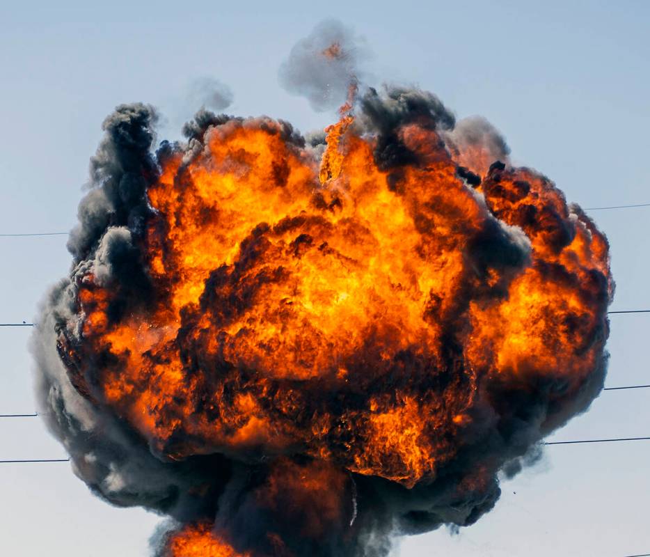 A fireball erupts during a controlled explosion on a media tour for the Las Vegas Fire & Rescue ...