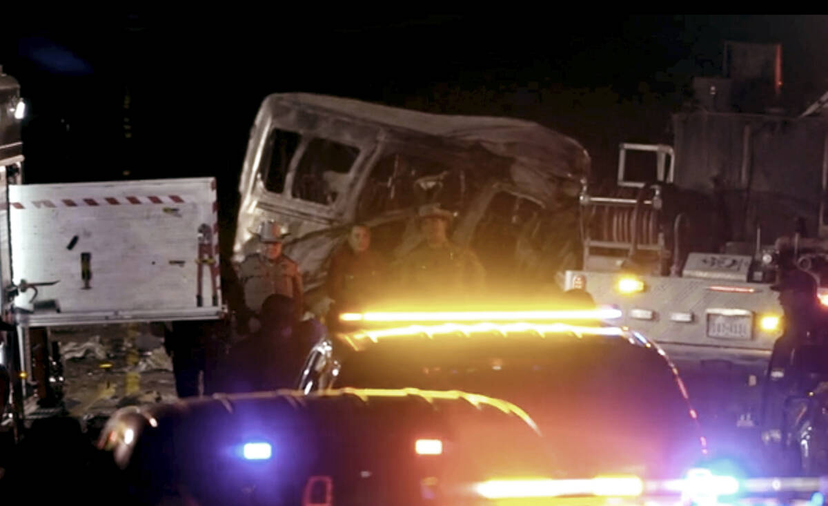 Emergency responders work the scene of a fatal crash late Tuesday, March 15, 2022 in Andrews Co ...