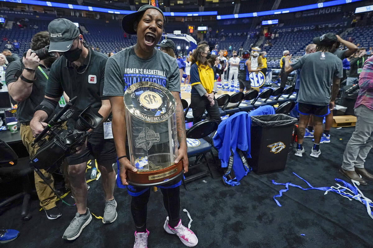 Kentucky's Dre'una Edwards carries the trophy after Kentucky beat South Carolina in the NCAA wo ...