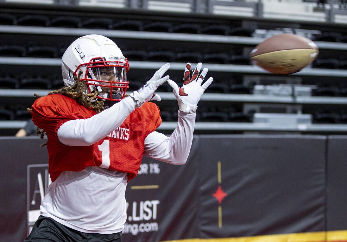 Knight Hawks wide receiver Traveon Samuel looks to make a catch during open practice at the Dol ...