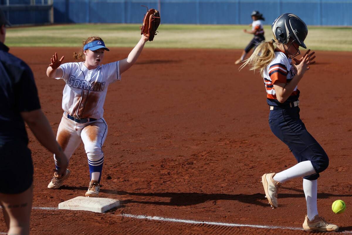 Legacy’s Brytnee Caldwell (4) runs to first base safely after Bishop Gorman’s Jordyn Fray ( ...