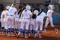 Chloe Makinney (1) runs home after a three-run homer against Legacy during a softball game at B ...