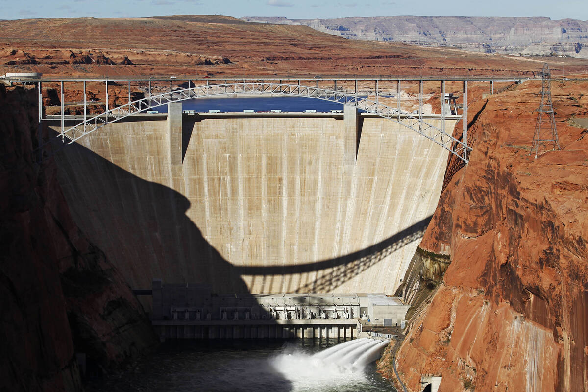 Water is released into the Colorado River at the Glen Canyon Dam in Page, Ariz., in November 20 ...