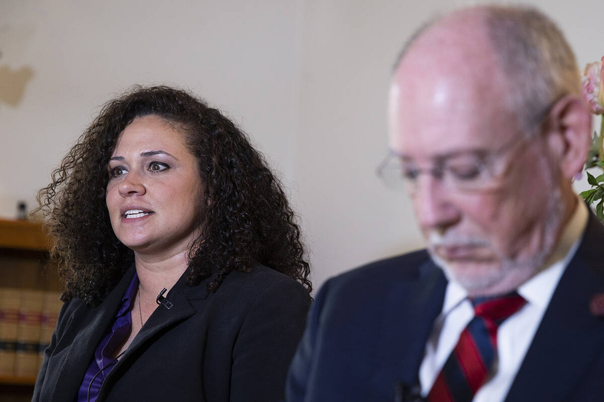 Shushan Sadjadi, a math teacher at Garside Junior High School, and her attorney Brian Berman, a ...
