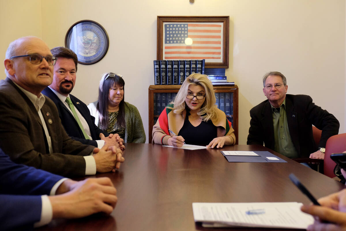 Las Vegas City Councilwoman Michele Fiore completes paperwork for her candidacy for state treas ...