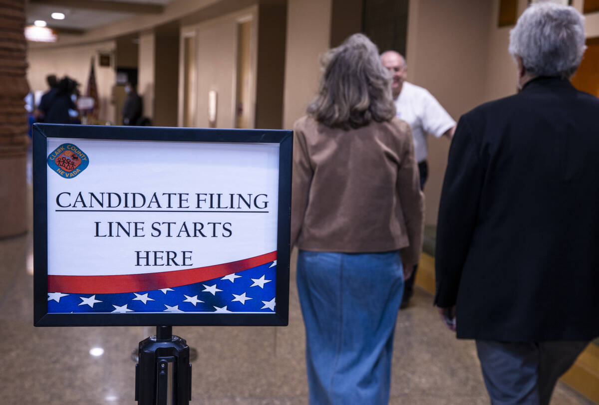 Rep. Dina Titus, D-Nev., walks with former Las Vegas City Councilman Bob Coffin as she readies ...