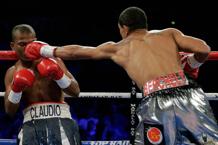 Miguel Berchelt, right, of Merida, Mexico, lands a punch against Carlos Claudio during a super ...