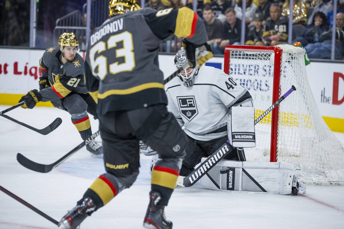 Golden Knights right wing Evgenii Dadonov (63) sends a puck towards the net as Los Angeles King ...