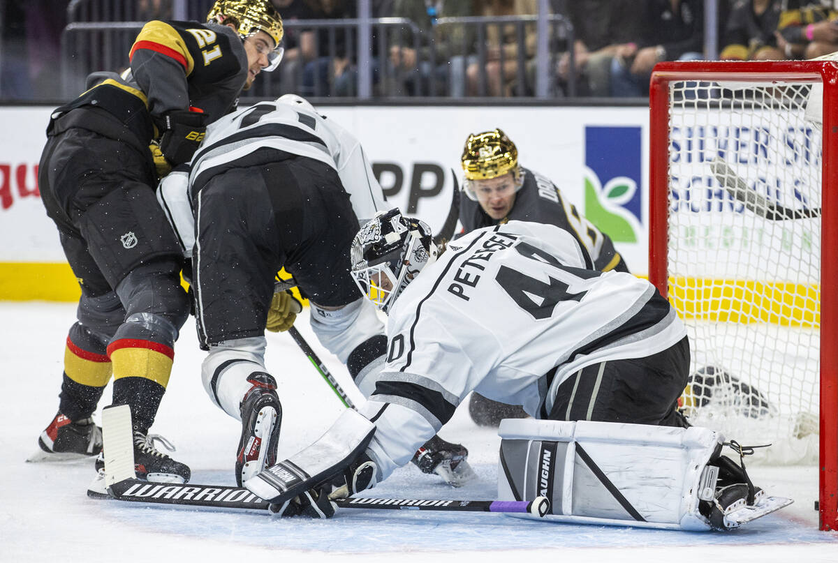 Los Angeles Kings goaltender Cal Petersen (40) is unable to stop a shot by Golden Knights right ...