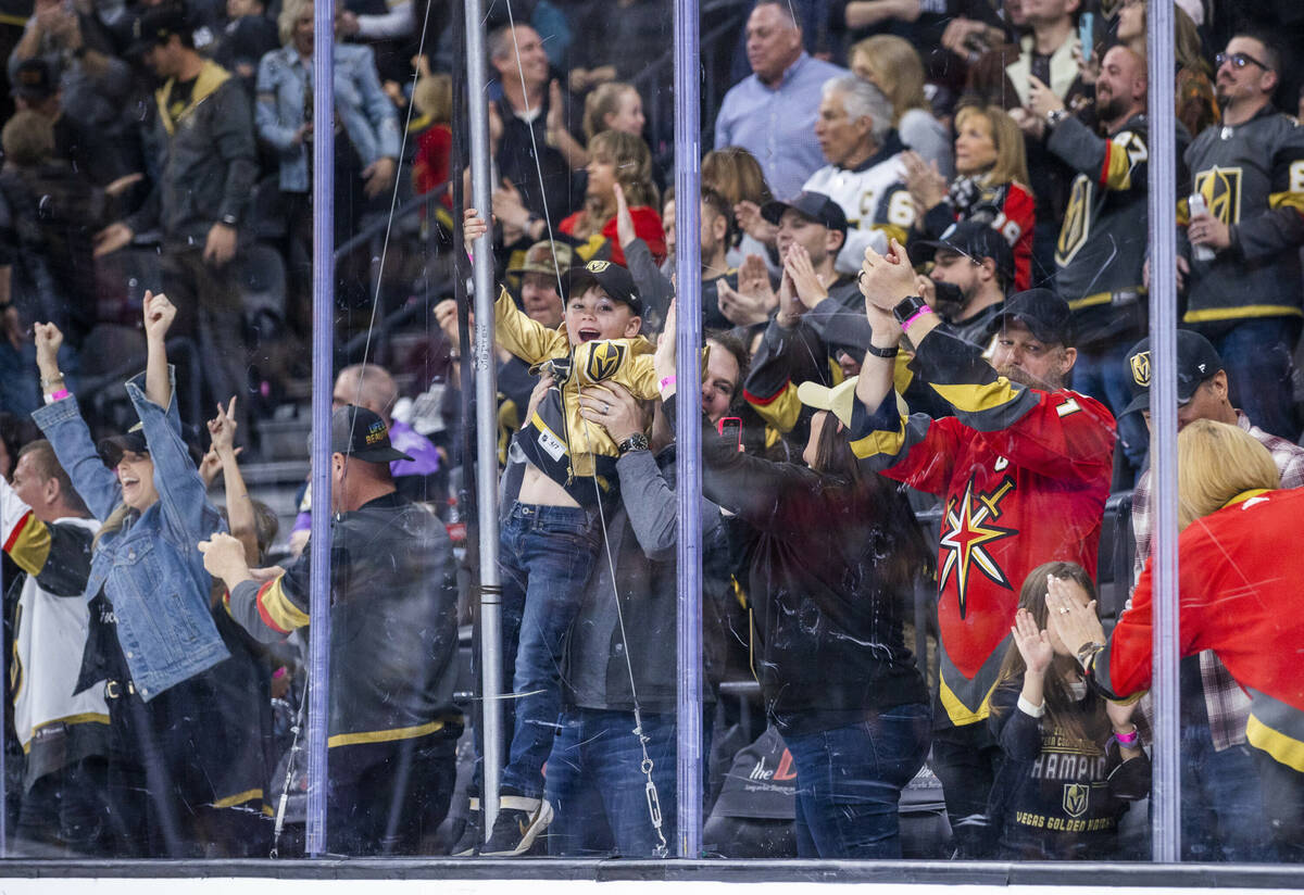 Golden Knights fans celebrate another score over the Los Angeles Kings during the third period ...