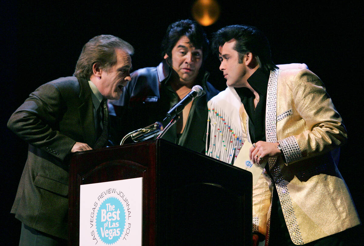 Bill Acosta, left, and Elvis impersonators, from the left, Michael Conti, Brendan Paul (hidden) ...