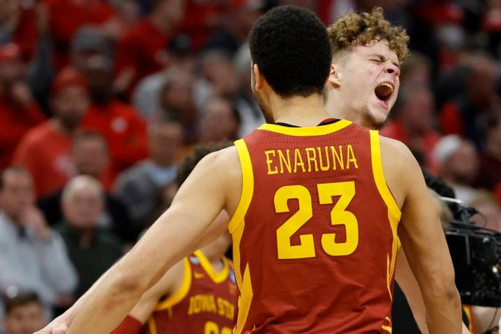 Iowa State's Tristan Enaruna and Aljaz Kunc react after a second-round NCAA college basketball ...
