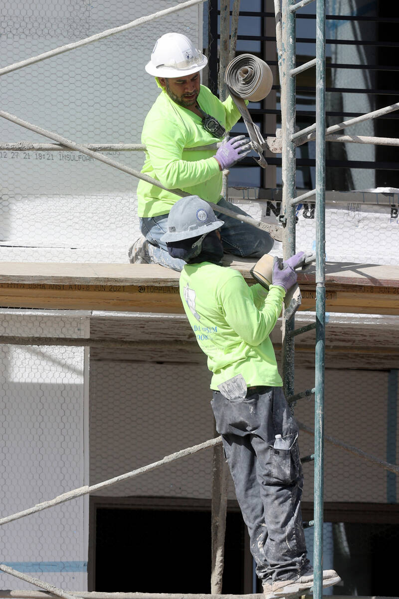 A crew works at the Maverick apartment complex under construction in the southwest Las Vegas Va ...