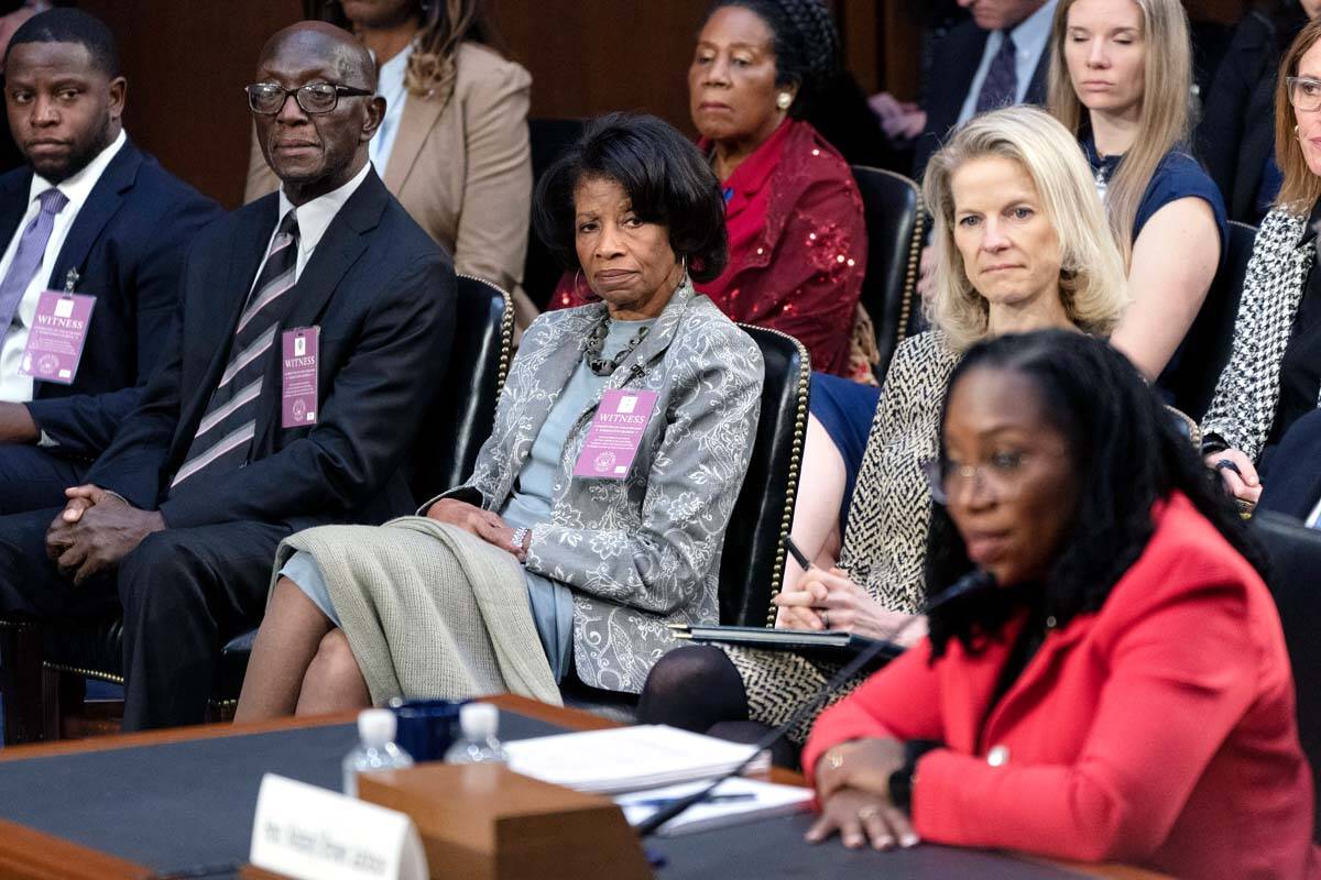 Supreme Court nominee Ketanji Brown Jackson, right, testifies about how her parents attended se ...