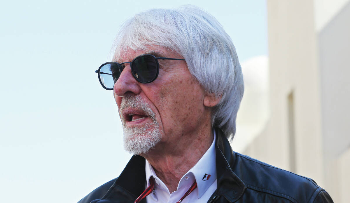 Former Formula One boss Bernie Ecclestone walks in the paddock during the first free practice a ...
