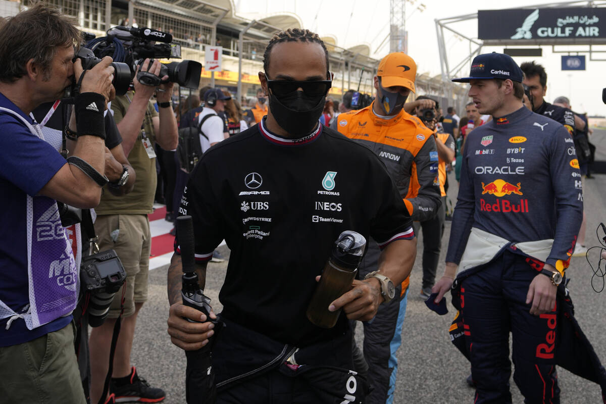Mercedes driver Lewis Hamilton of Britain, left, Red Bull driver Max Verstappen of the Netherla ...