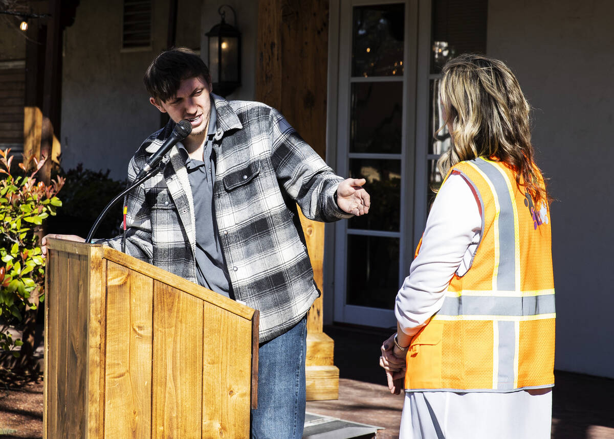 Grant Tache, left, thanks his mother Lynda Tache, executive director of Collaboration Center Fo ...