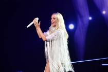 Carrie Underwood performs during her premiere at the Theater at Resorts World on Wednesday, Dec ...