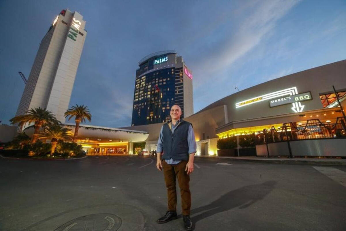 Celebrity chef Michael Symon stands in front of his restaurant — Mabel’s BBQ — in the Pal ...