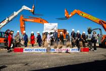 Officials and dignitaries pose while breaking ground on West Henderson Hospital on Wednesday, M ...