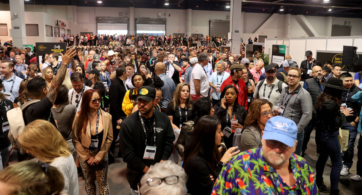 Conventioneers wait for the show floor to open during the Bar & Restaurant Expo at the Las ...
