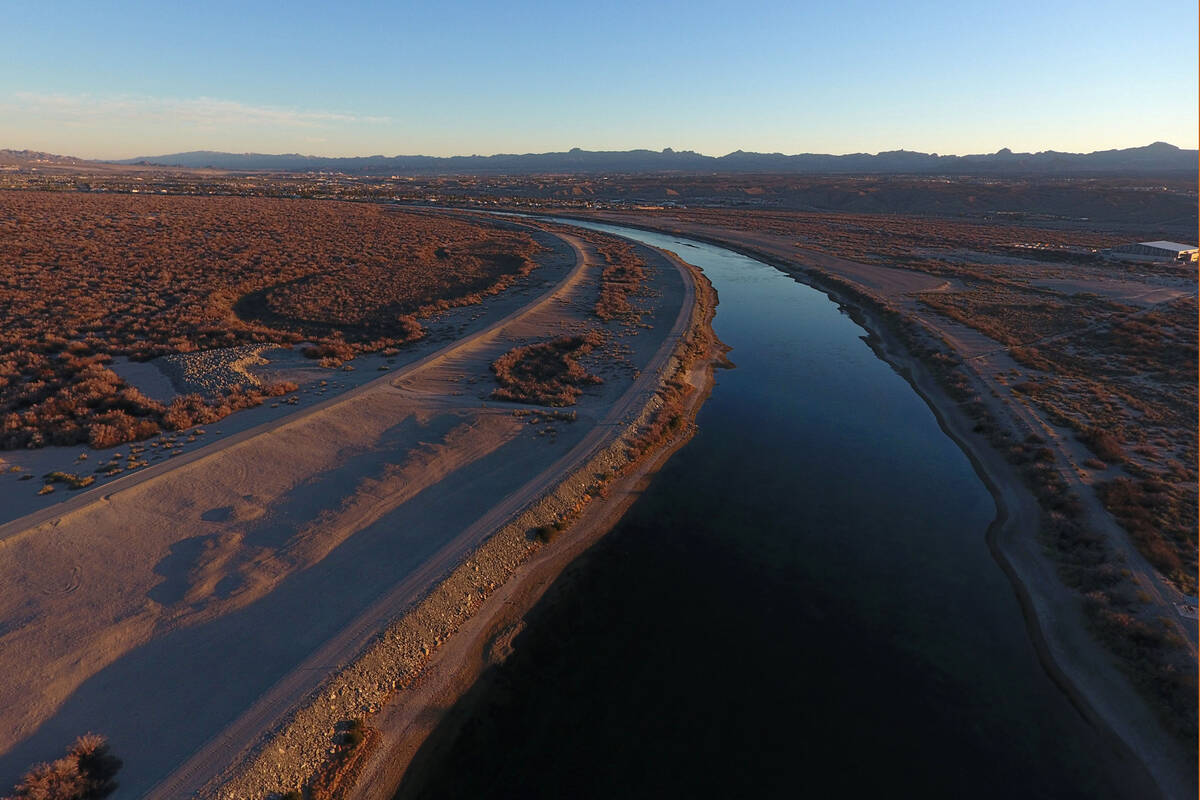 This Jan. 25, 2019, file aerial photo shows sunrise on the Colorado River just below Laughlin, ...
