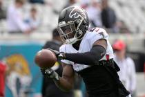 Atlanta Falcons safety Duron Harmon (21) warms up before an NFL football game against the Jacks ...