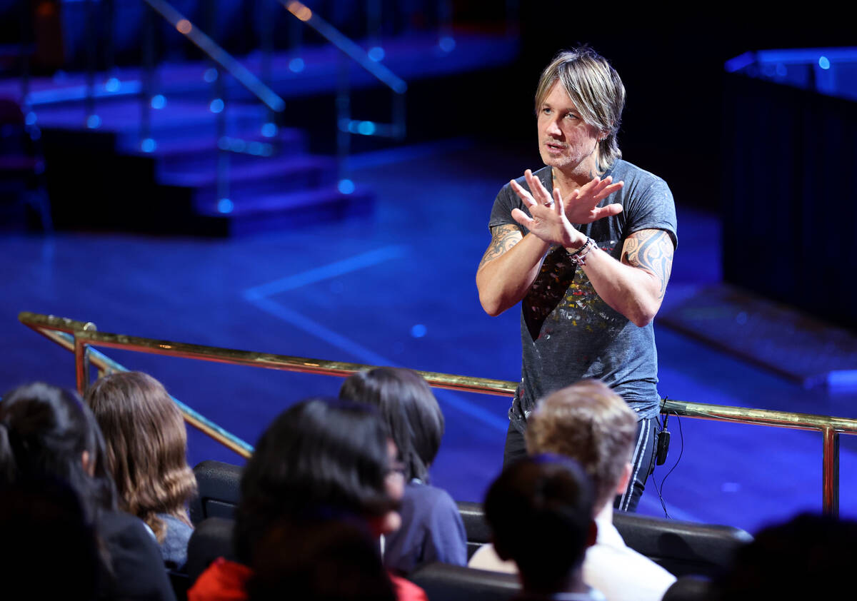 Caesars resident artist Keith Urban talks to 30 guitar students from Las Vegas Academy at the C ...