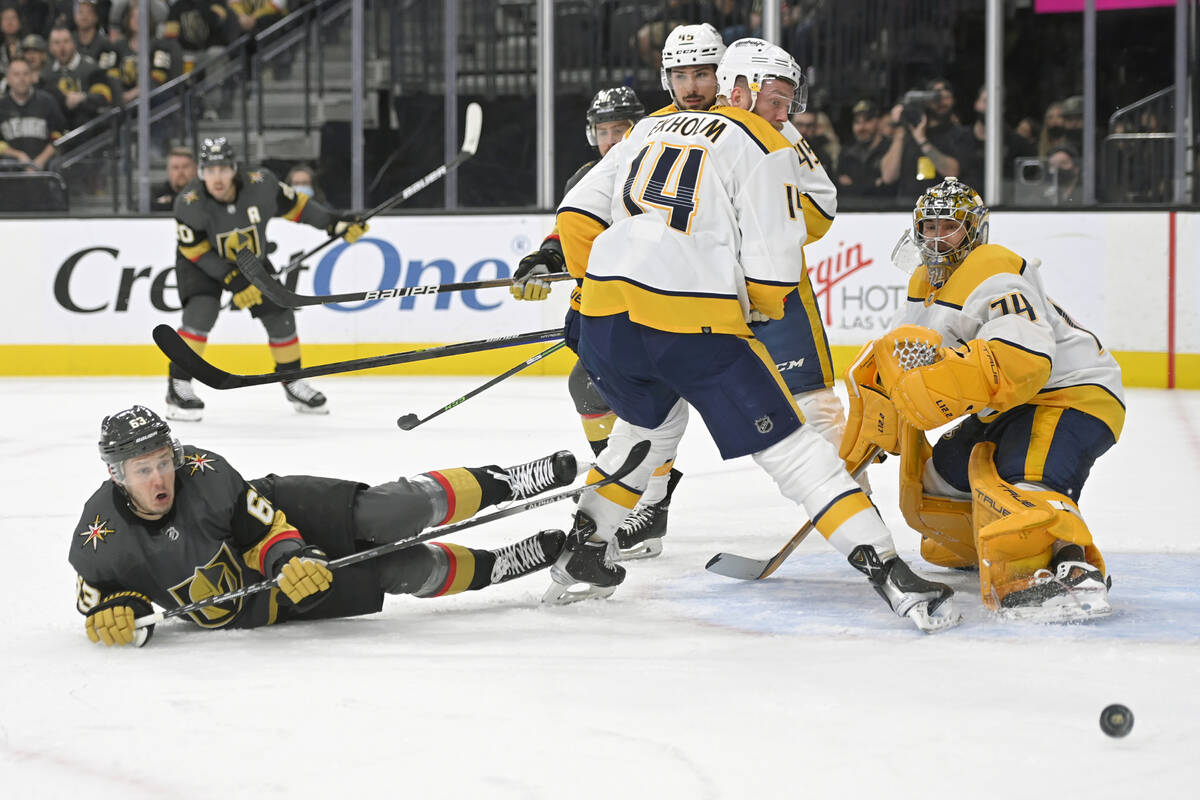 Vegas Golden Knights right wing Evgenii Dadonov (63) watches the puck after a shot against the ...