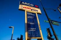 Rising gas prices are seen at an Arco gas station on Monday, March 14, 2022, in Las Vegas. (Cha ...