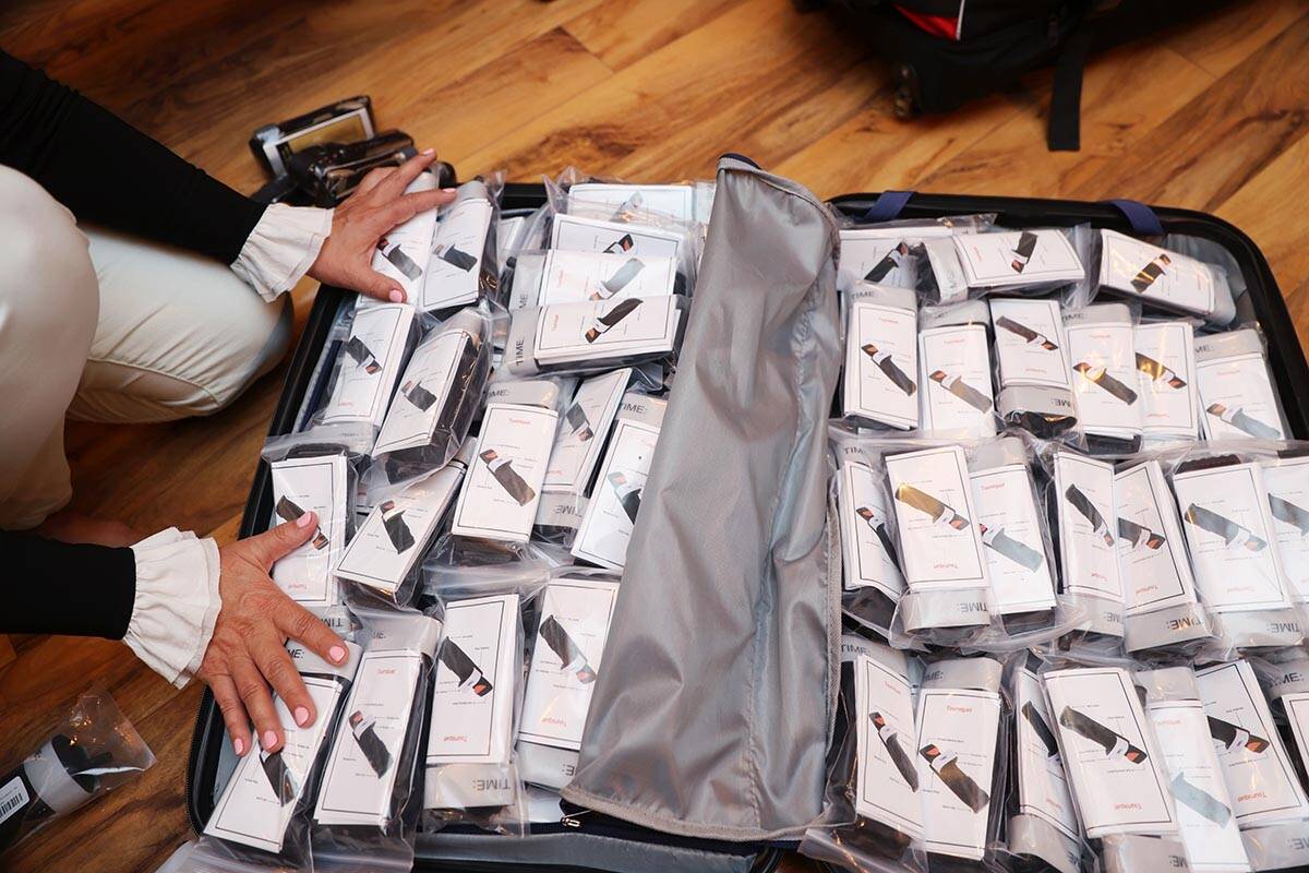 Alona Burns packs hundreds of donated tourniquets at her Las Vegas home Friday, March 25, 2022. ...