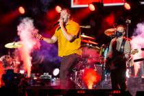 In this Aug. 27, 2021, file photo, Imagine Dragons frontman Dan Reynolds performs in Las Vegas. ...