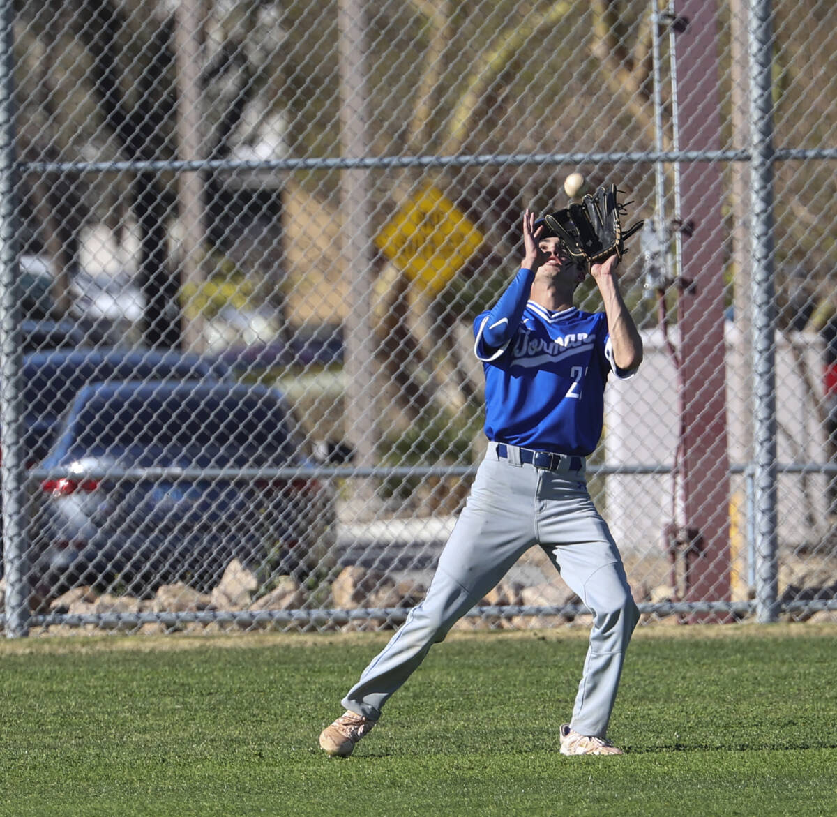 Bishop Gorman outfielder Tommy Rose (23) catches a fly ball from Cimarron-Memorial during a bas ...