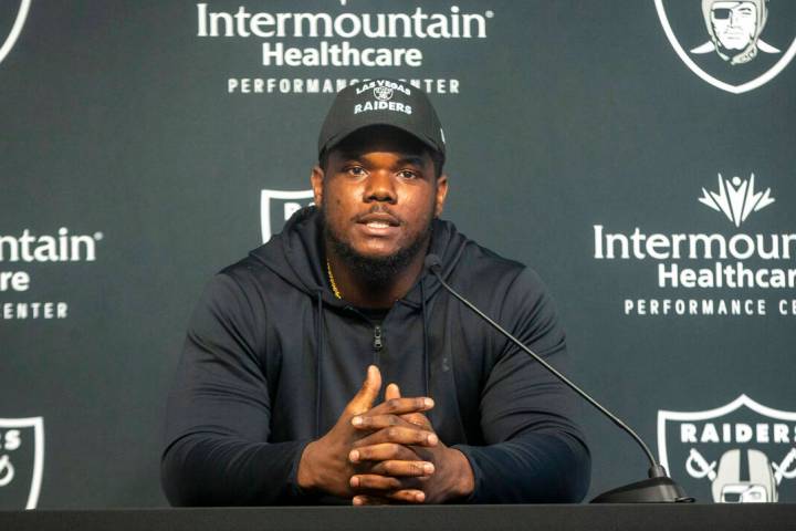 Raiders defensive tackle Bilal Nichols answers questions during a news conference at the Raider ...