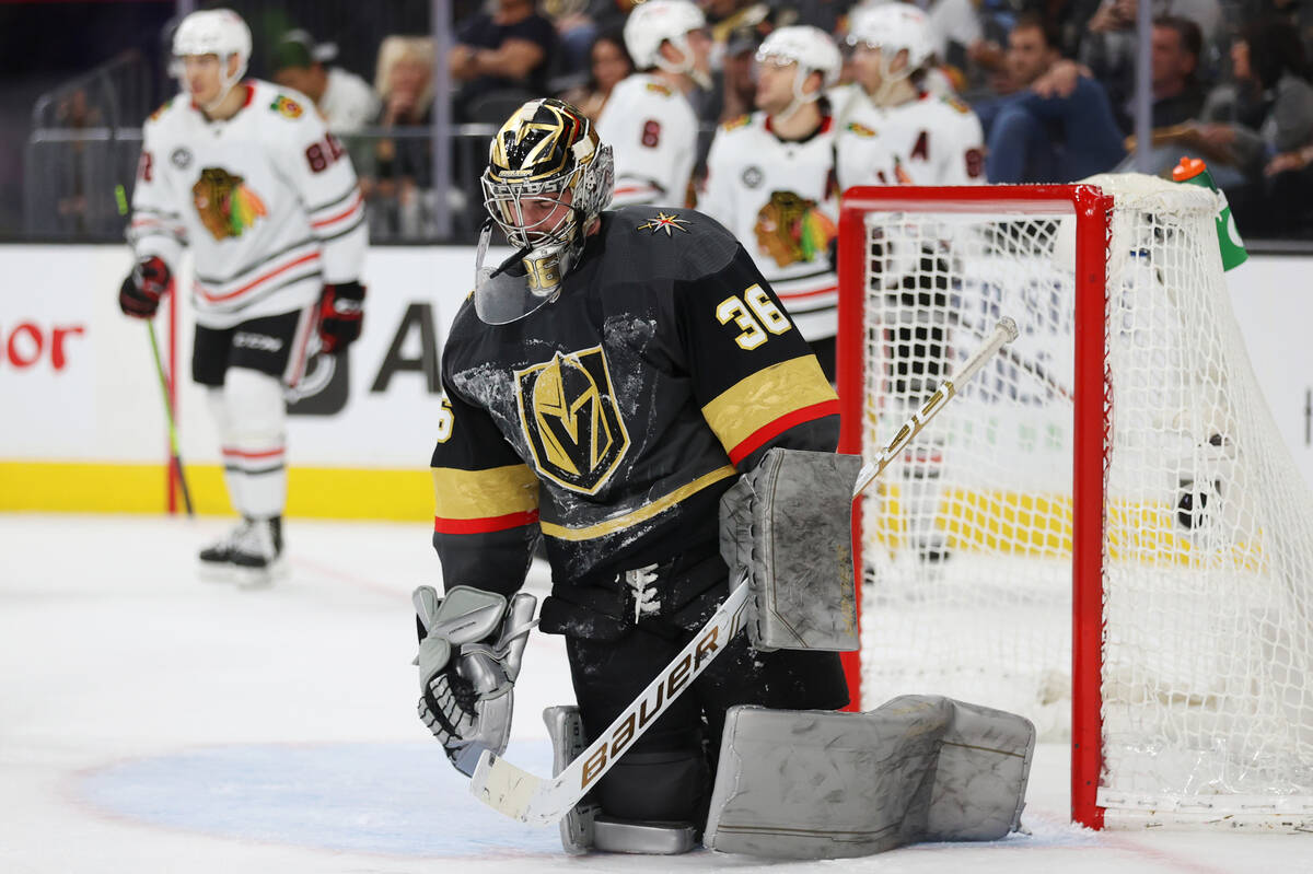 Vegas Golden Knights goaltender Logan Thompson (36) lowers his head after allowing a goal again ...