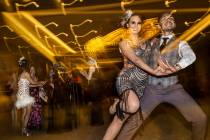 David Rodriguez, right, and Katie DeGraff dance during the 19th annual Junior League of Las Veg ...