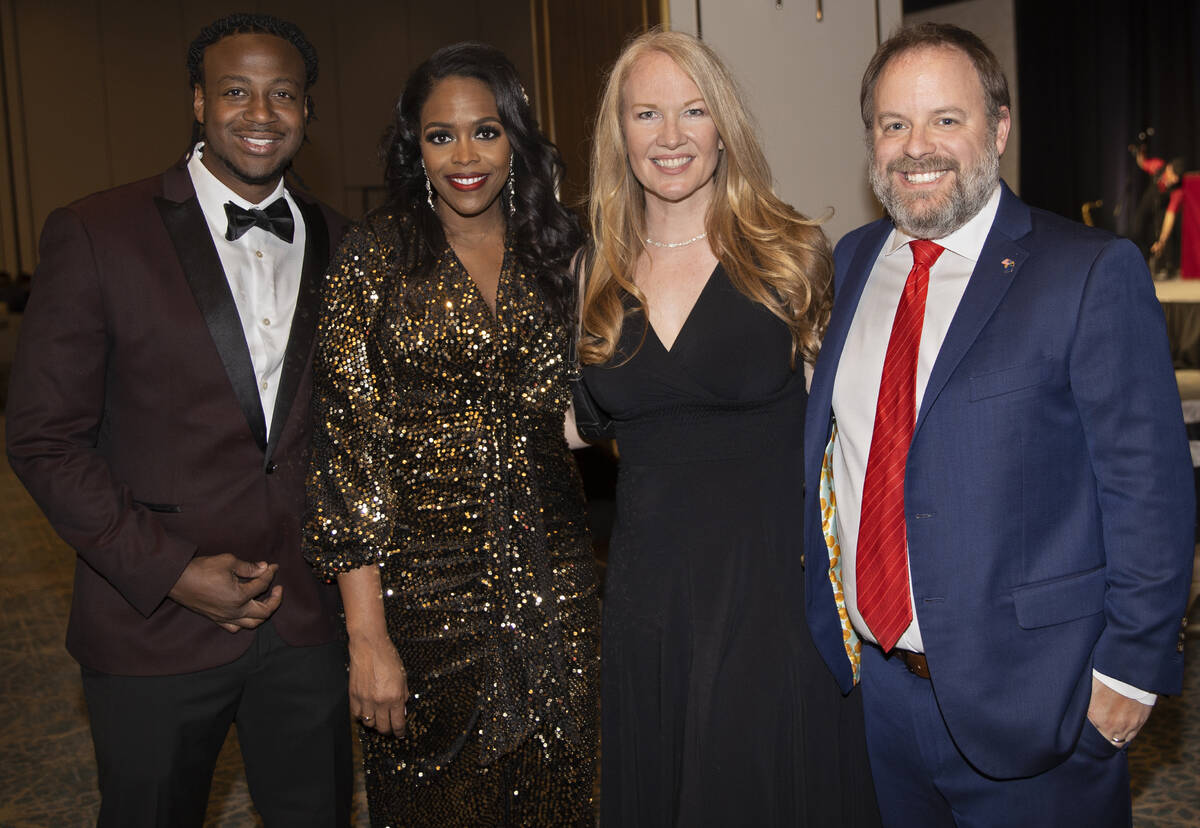 Nevada Treasurer Zach Conine, from right, Layke Martin-Connine, Tya Mathis-Coleman and Dr. Sebe ...