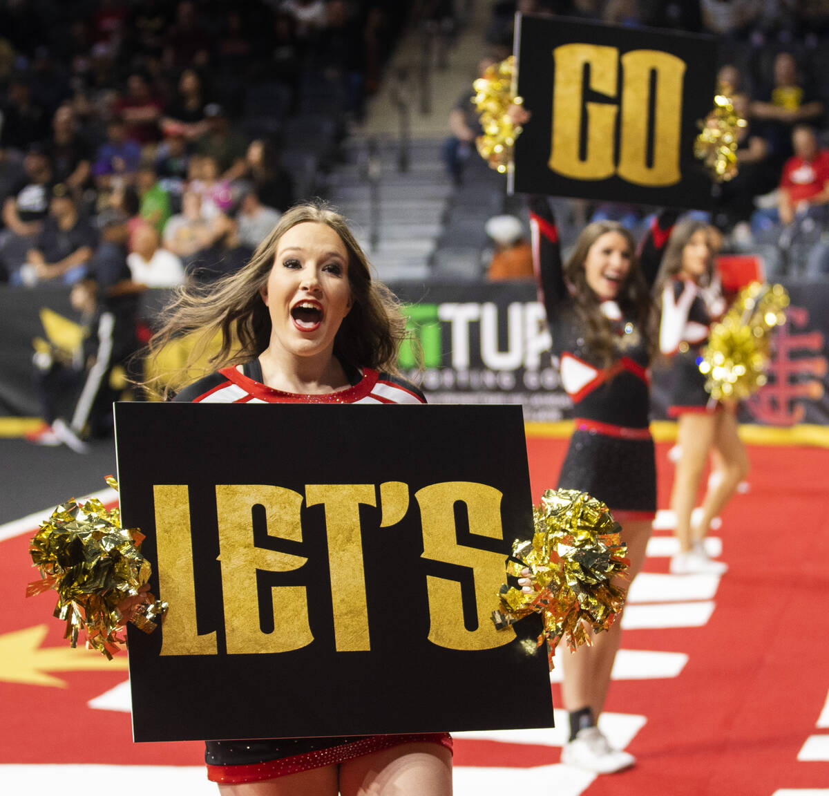 Vegas Knight Hawks cheerleaders fire up the crowd in the first half during an Indoor Football L ...