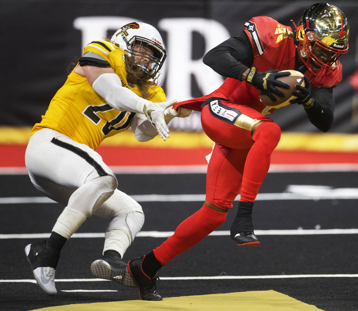 Vegas Knight Hawks wide receiver K.D. Cannon (6) fights for extra yardage against Tucson Sugar ...