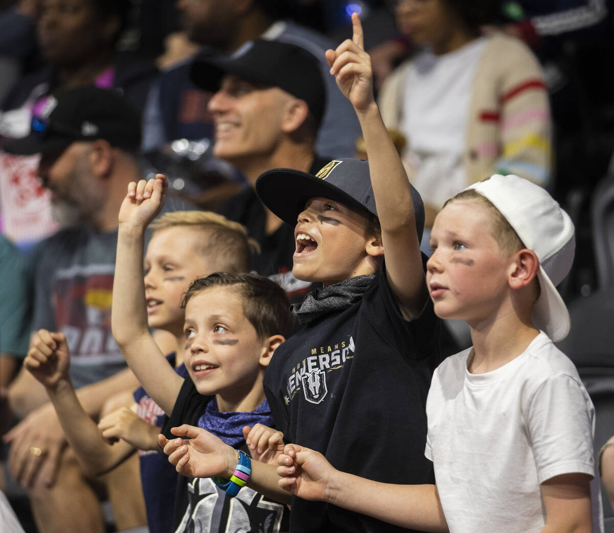 Vegas Knight Hawks fans cheer for their team during an Indoor Football League game against the ...