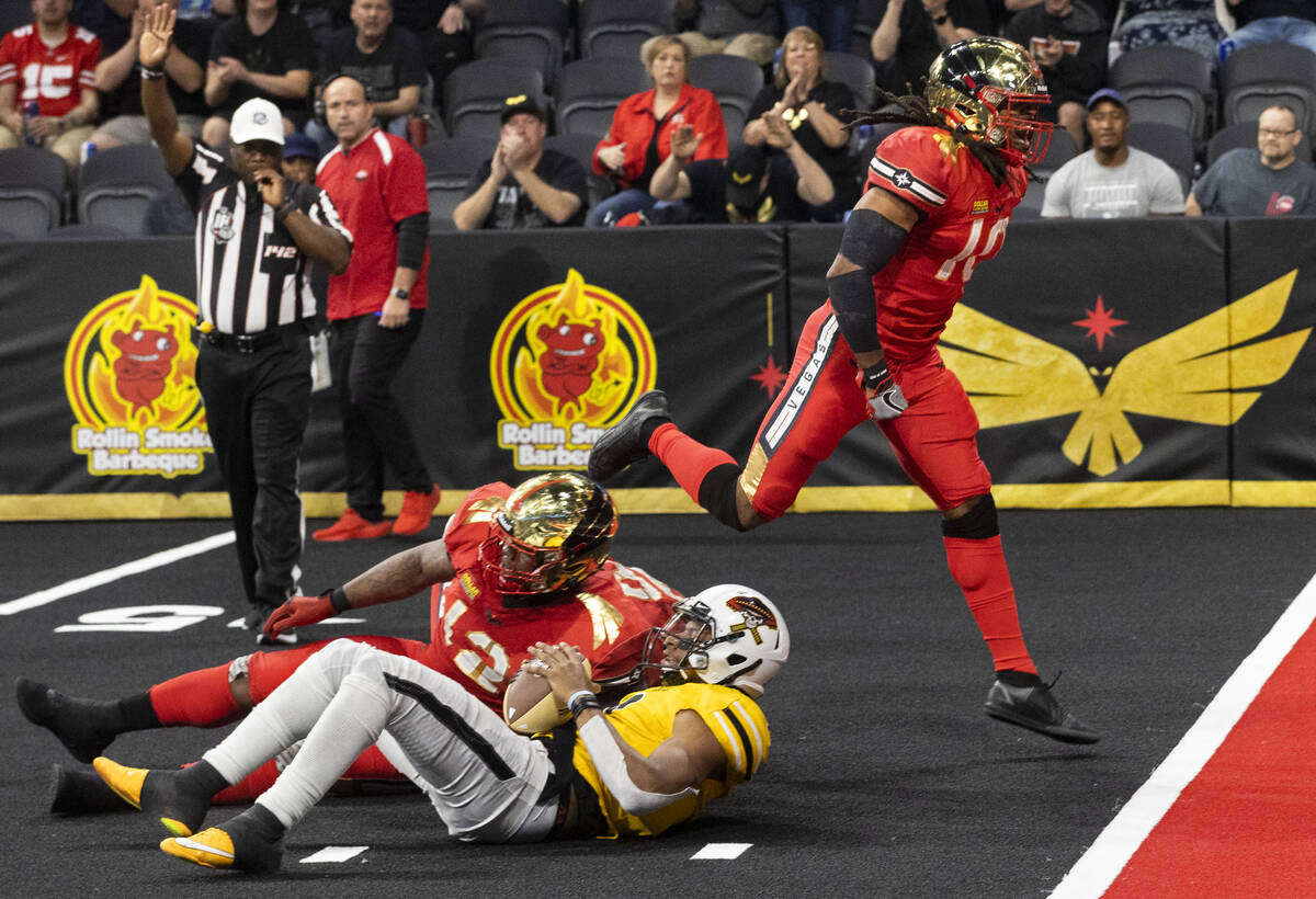 Vegas Knight Hawks linebacker Gabriel McCoy (10) celebrates a big defensive stop in the first h ...