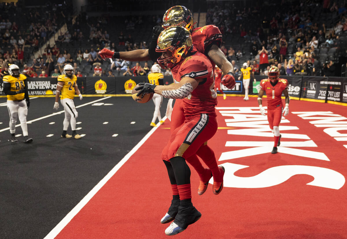 Vegas Knight Hawks running back Elad Covaliu (25) celebrates a touchdown catch in the second ha ...