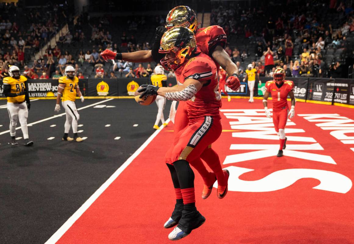 Vegas Knight Hawks running back Elad Covaliu (25) celebrates a touchdown catch in the second ha ...