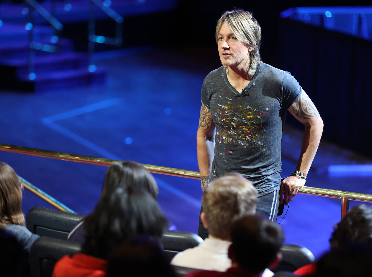 Caesars resident artist Keith Urban talks to 30 guitar students from Las Vegas Academy at the C ...