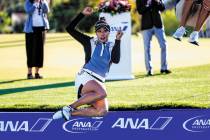 Patty Tavatanakit of Thailand, jumps into the water after winning the LPGA's ANA Inspiration go ...