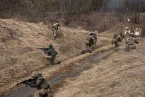 Ukrainian soldiers of the 103rd Separate Brigade of the Territorial Defense of the Armed Forces ...