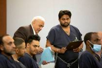 Nanak Singh, third from left, and Chandra Prakash, center right, attend a hearing in which thei ...