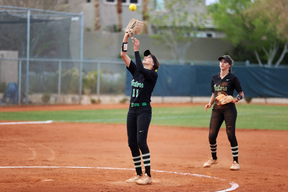 Green Valley’s Avari Morris (11) catch it a pop-up ball in the infield against Faith Lut ...