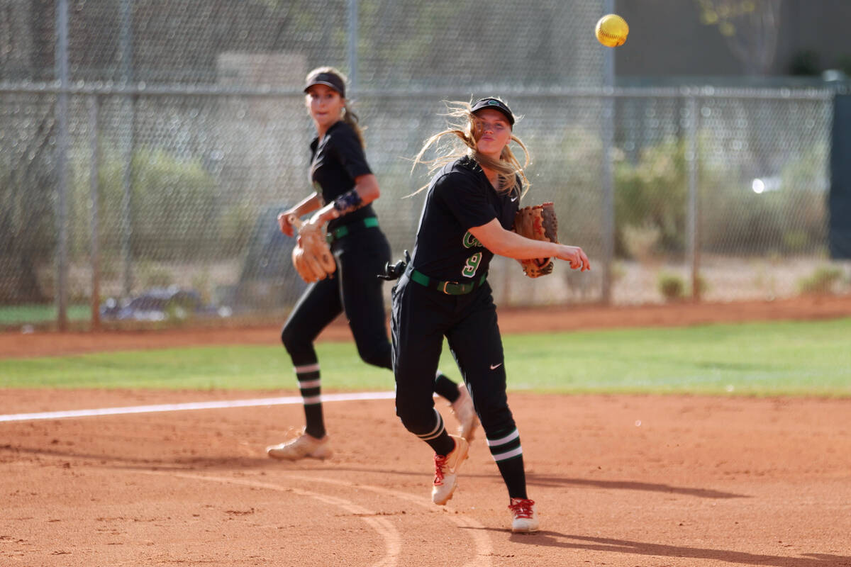 Green Valley’sAspyn Beattie (9) throws a ground ball to first baser for an out against F ...