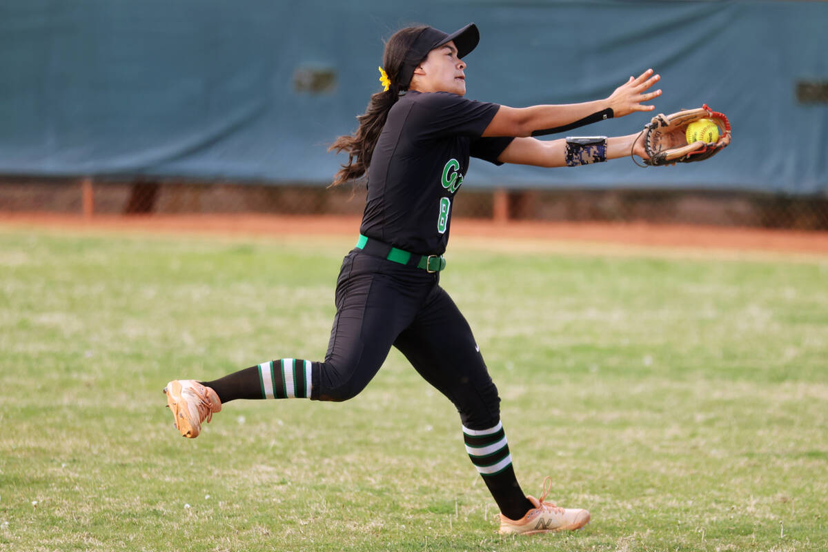 Green Valley’s Aspyn Beattie (8) makes a catch in the outfield against Faith Lutheran du ...